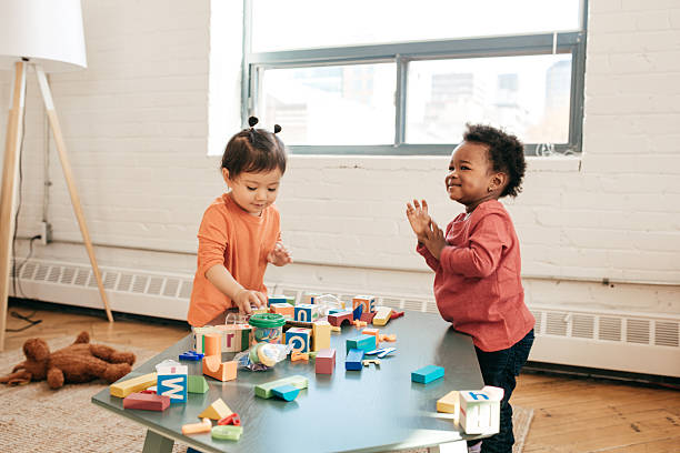 Two boy toddlers playing together