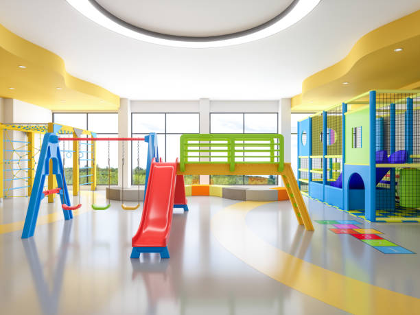 A slide, three swings and the soft play area are shown in the picture